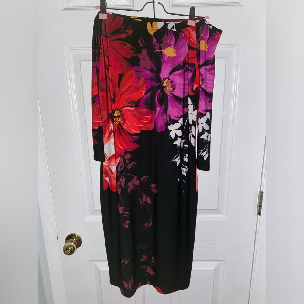 Black dress with floral designs , off the shoulder